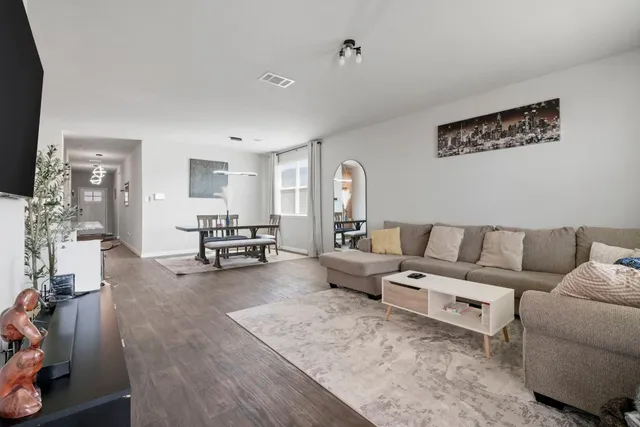 a living room with furniture and a couch