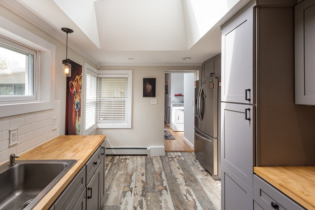 118 Wilkinson Street Worcester, MA 01606 - Photo 10 of 26 a view of a kitchen from the hallway