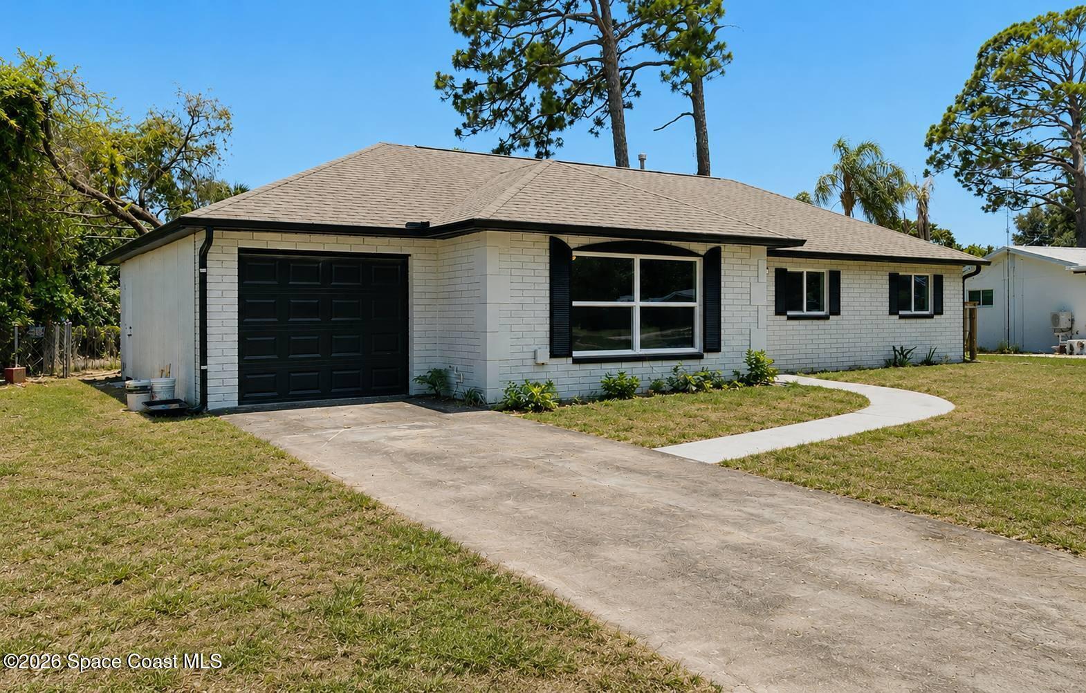 949 Lexington Road Rockledge, FL 32955 - Photo 2 of 22 2.1