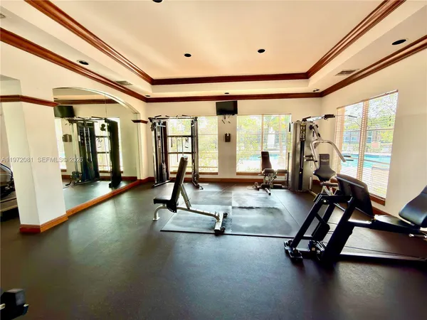 a view of a room with gym equipment