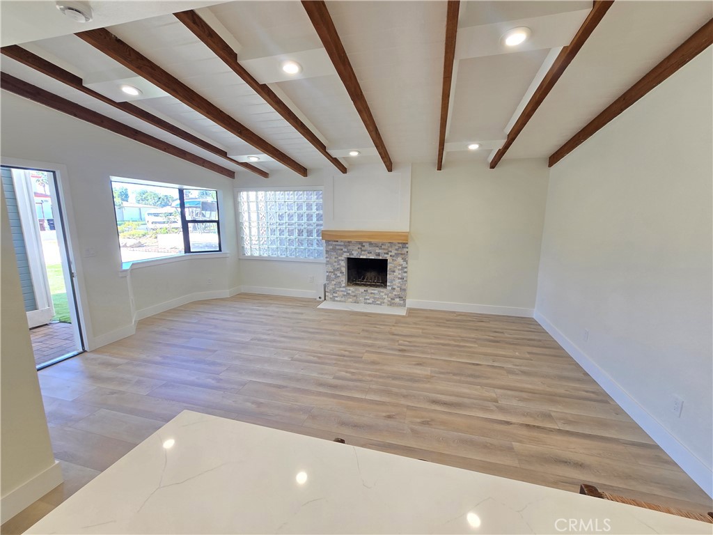 34516 Via Verde Dana Point, CA 92624 - Photo 2 of 15 an empty room with wooden floor and windows