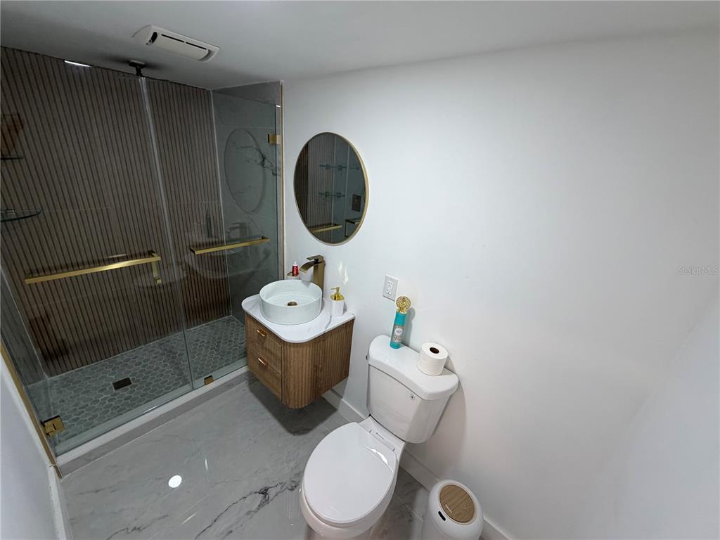 126 Miami Gardens Road West Park, FL 33023 - Photo 14 of 55 a bathroom with a sink toilet and shower