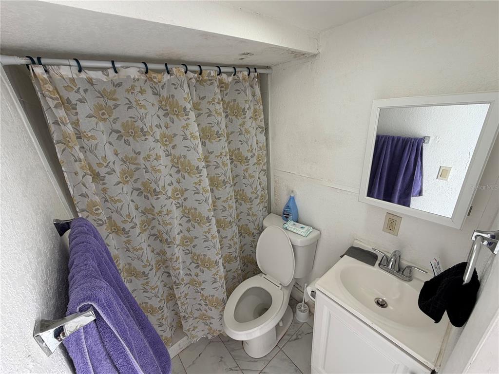 126 Miami Gardens Road West Park, FL 33023 - Photo 18 of 55 a bathroom with a toilet and a sink