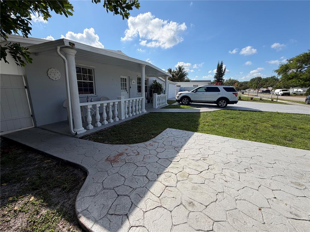 126 Miami Gardens Road West Park, FL 33023 - Photo 2 of 55 a view of a yard with cars parked