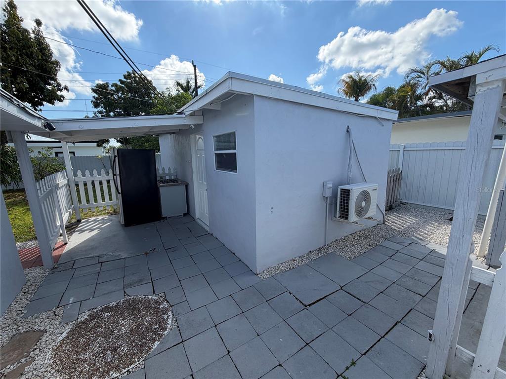 126 Miami Gardens Road West Park, FL 33023 - Photo 28 of 55 a view of a house with a garage