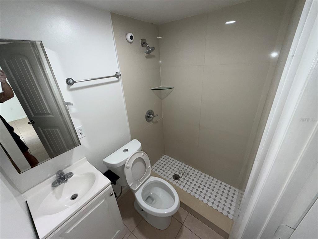 126 Miami Gardens Road West Park, FL 33023 - Photo 38 of 55 a bathroom with a sink and toilet