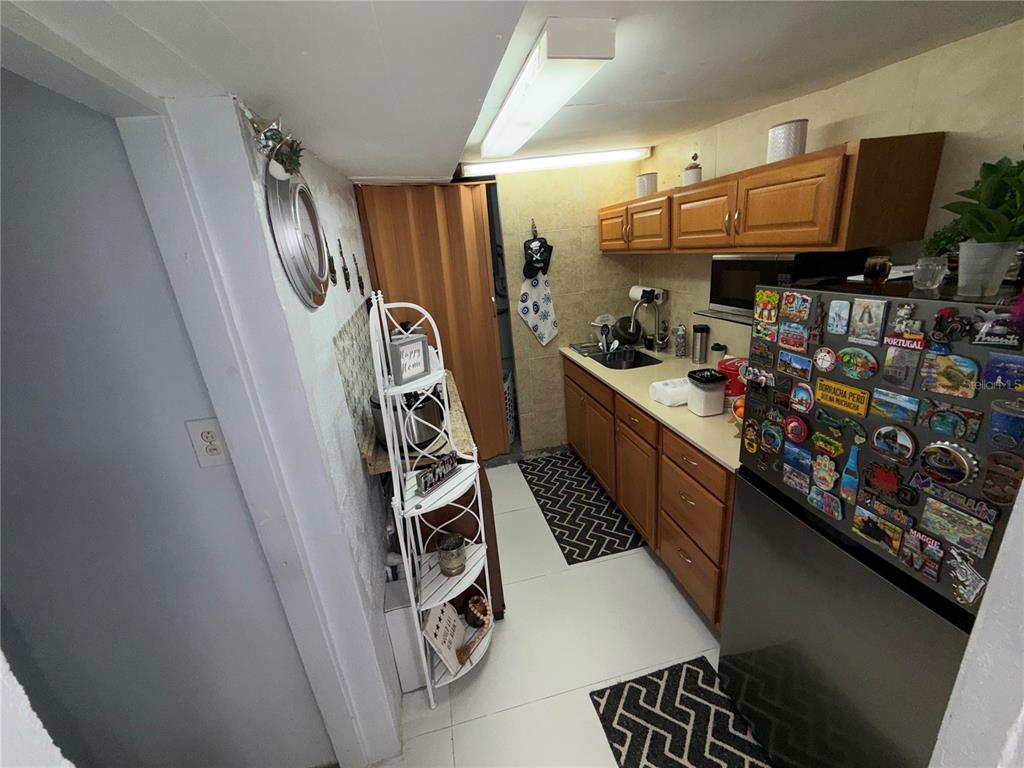 126 Miami Gardens Road West Park, FL 33023 - Photo 43 of 55 a view of a room with racks