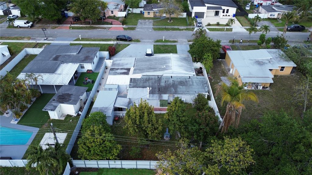 126 Miami Gardens Road West Park, FL 33023 - Photo 47 of 55 an aerial view of residential houses with outdoor space and street view