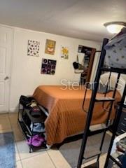 126 Miami Gardens Road West Park, FL 33023 - Photo 50 of 55 a bedroom with furniture and a dresser