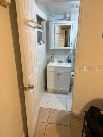 126 Miami Gardens Road West Park, FL 33023 - Photo 51 of 55 a bathroom with a sink and a mirror