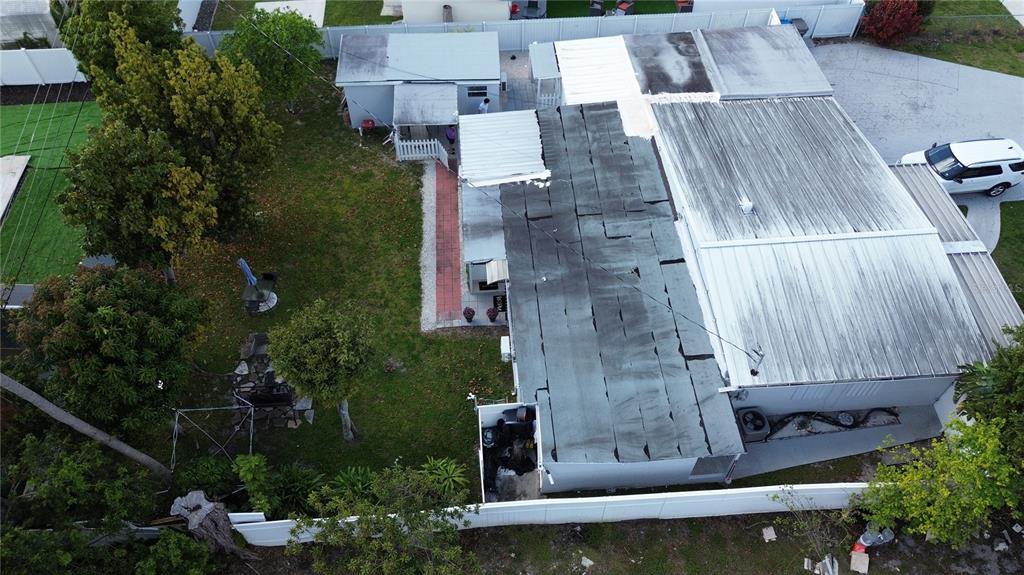 126 Miami Gardens Road West Park, FL 33023 - Photo 6 of 55 an aerial view of residential house with outdoor space and trees all around