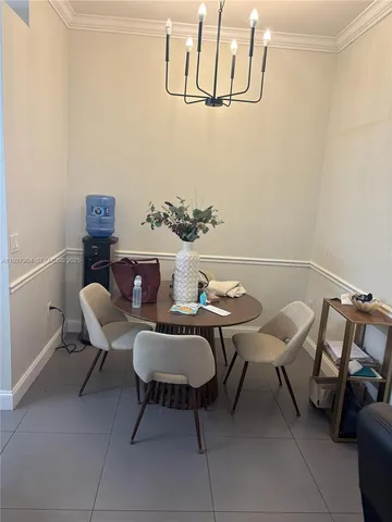 a view of a room with furniture and rug