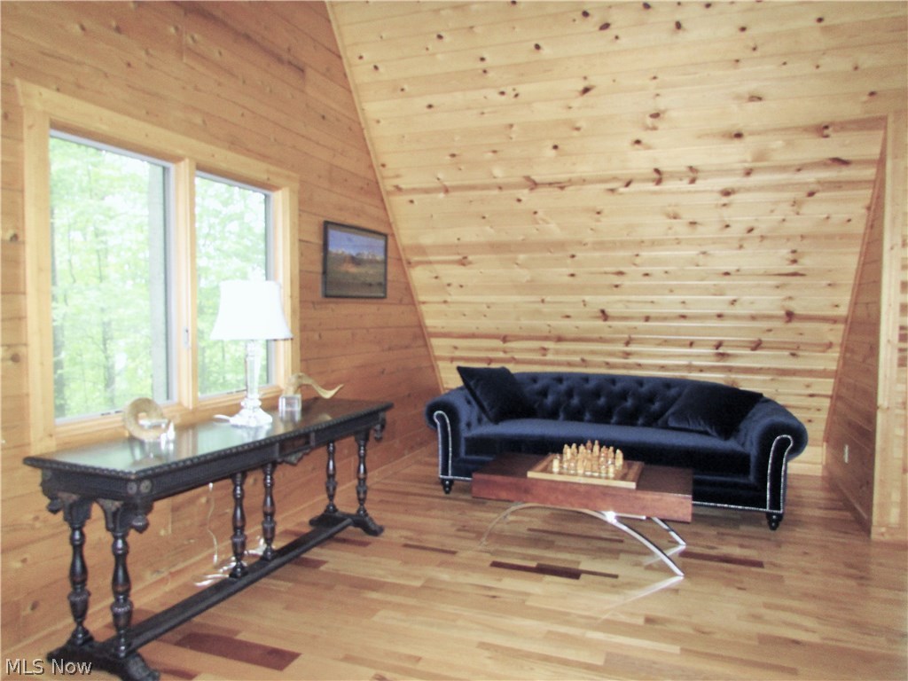 6840 Williams Road Painesville, OH 44077 - Photo 28 of 34 The upstairs family/media room offers several areas for watching tv, movie night, games or just quiet reading.