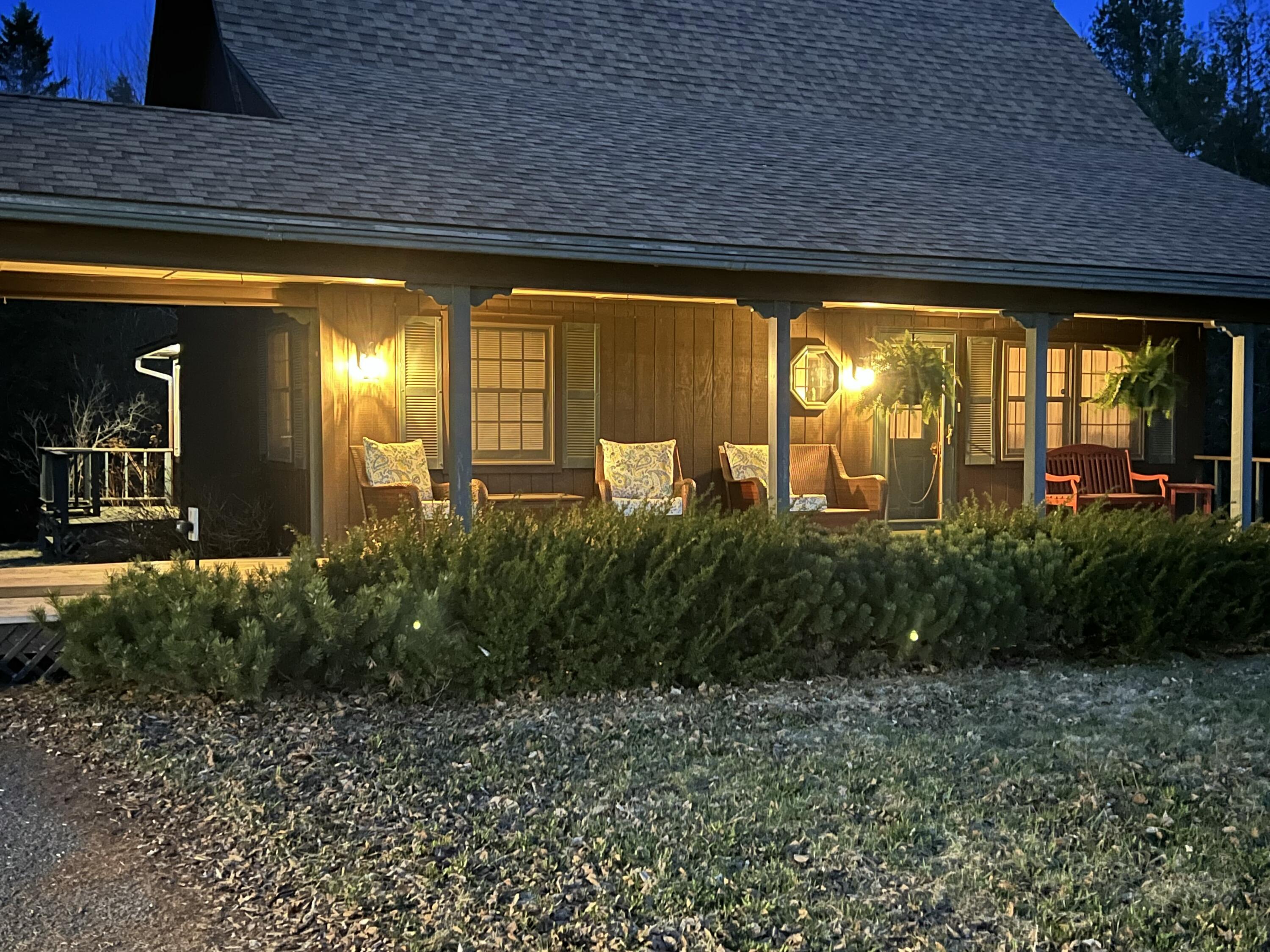 212 Timoney Lake Road Smyrna, ME 04780 - Photo 44 of 50 Autumn Evening on the porch
