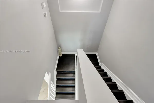 a view of entryway with stairs