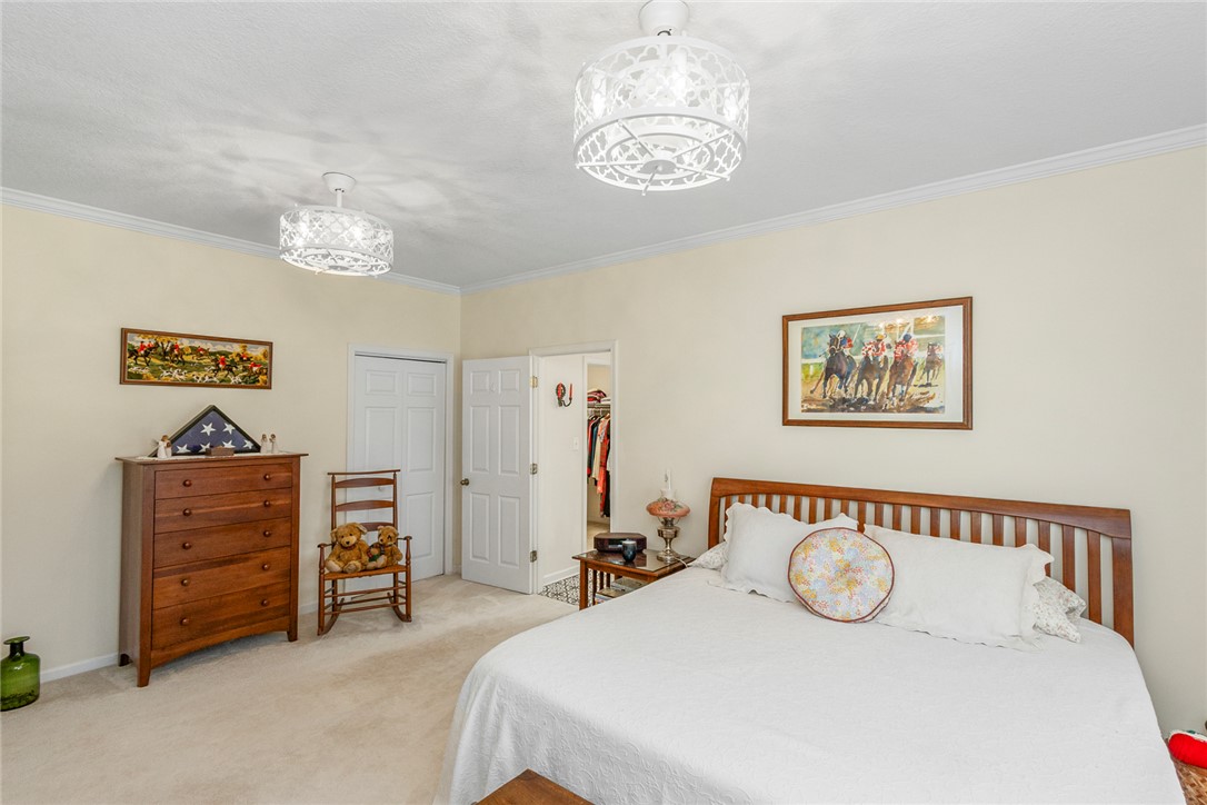 108 Pearman Drive Pendleton, SC 29670 - Photo 28 of 50 This cozy bedroom offers a tranquil retreat with soft lighting and ample storage.