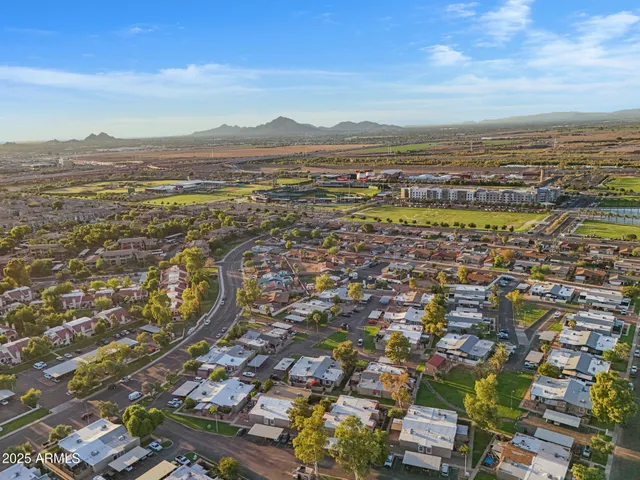an aerial view of residential building with parking space