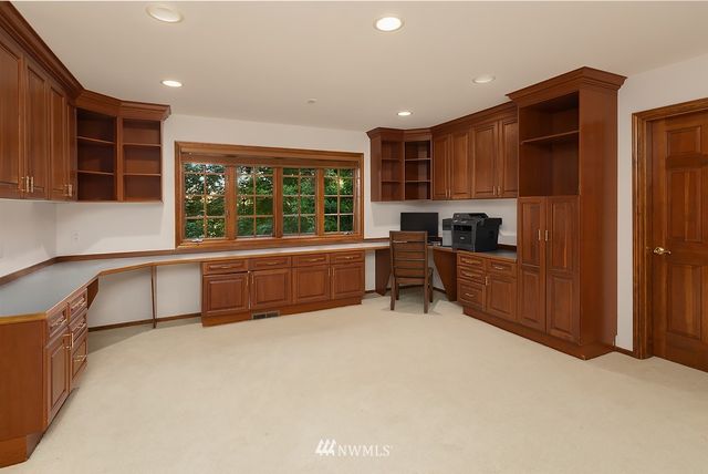 a kitchen with stainless steel appliances a refrigerator and a sink