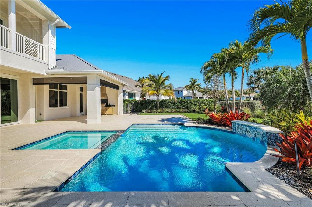 16716 Enclave Circle Naples, FL 34110 - Photo 47 of 50 Combined pool / hot tub featuring a patio and a balcony