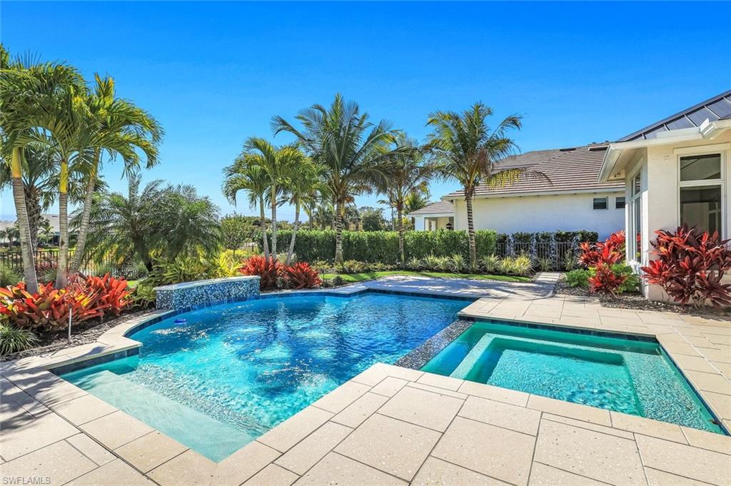16716 Enclave Circle Naples, FL 34110 - Photo 48 of 50 Combined pool / hot tub featuring a patio area