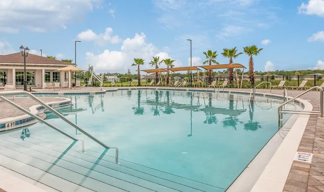 a view of a lake with a large building
