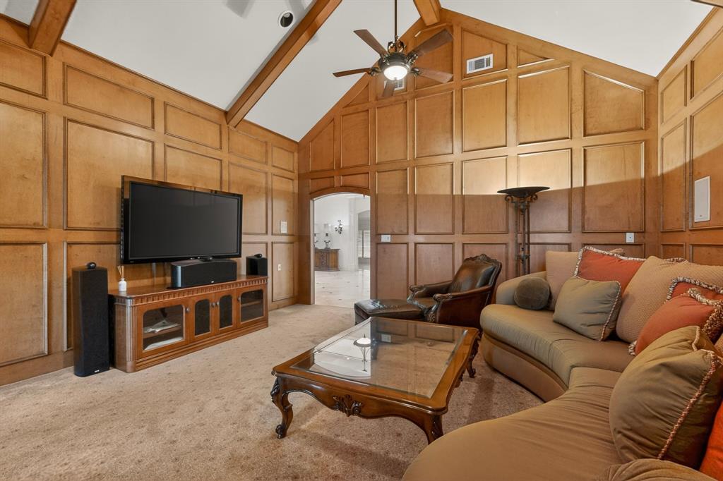 2405 Wing Point Lane Plano, TX 75093 - Photo 11 of 39 a living room with furniture and a flat screen tv