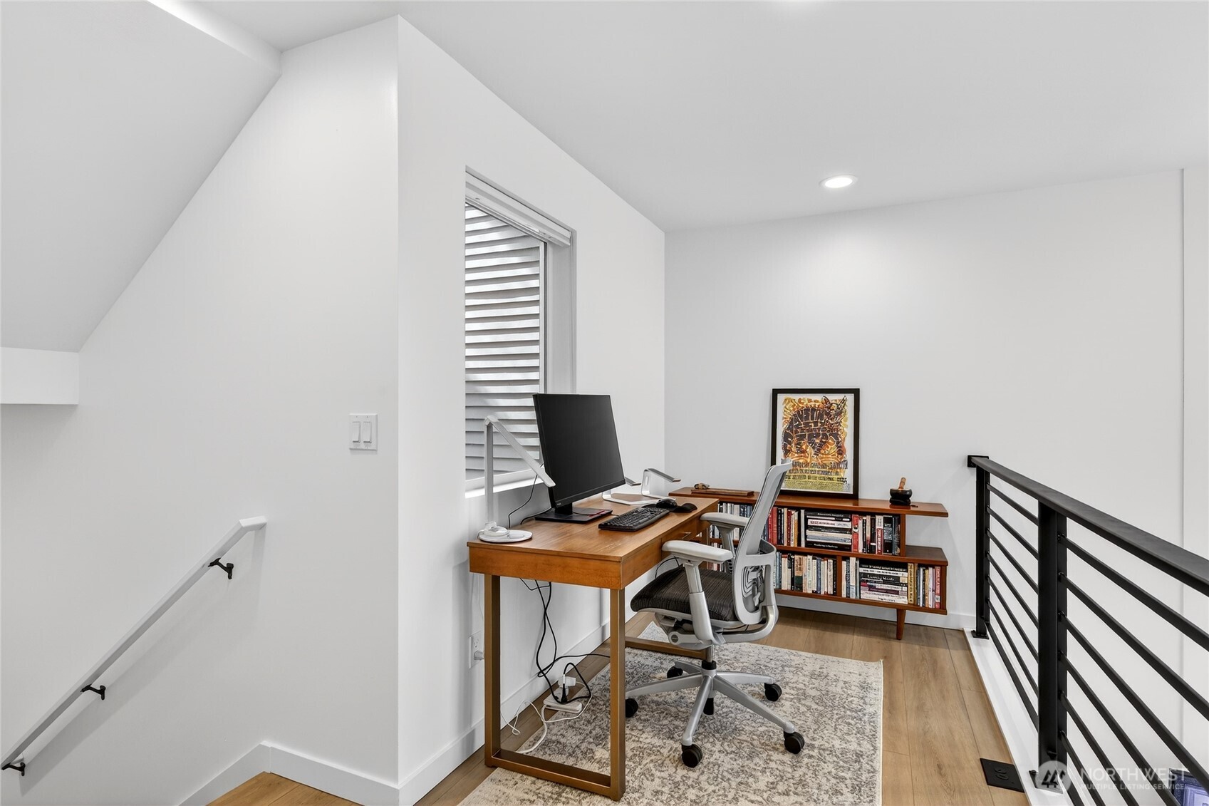 6320 41st Avenue Southwest, Unit B Seattle, WA 98136 - Photo 13 of 31 a view of a workspace with furniture and a window