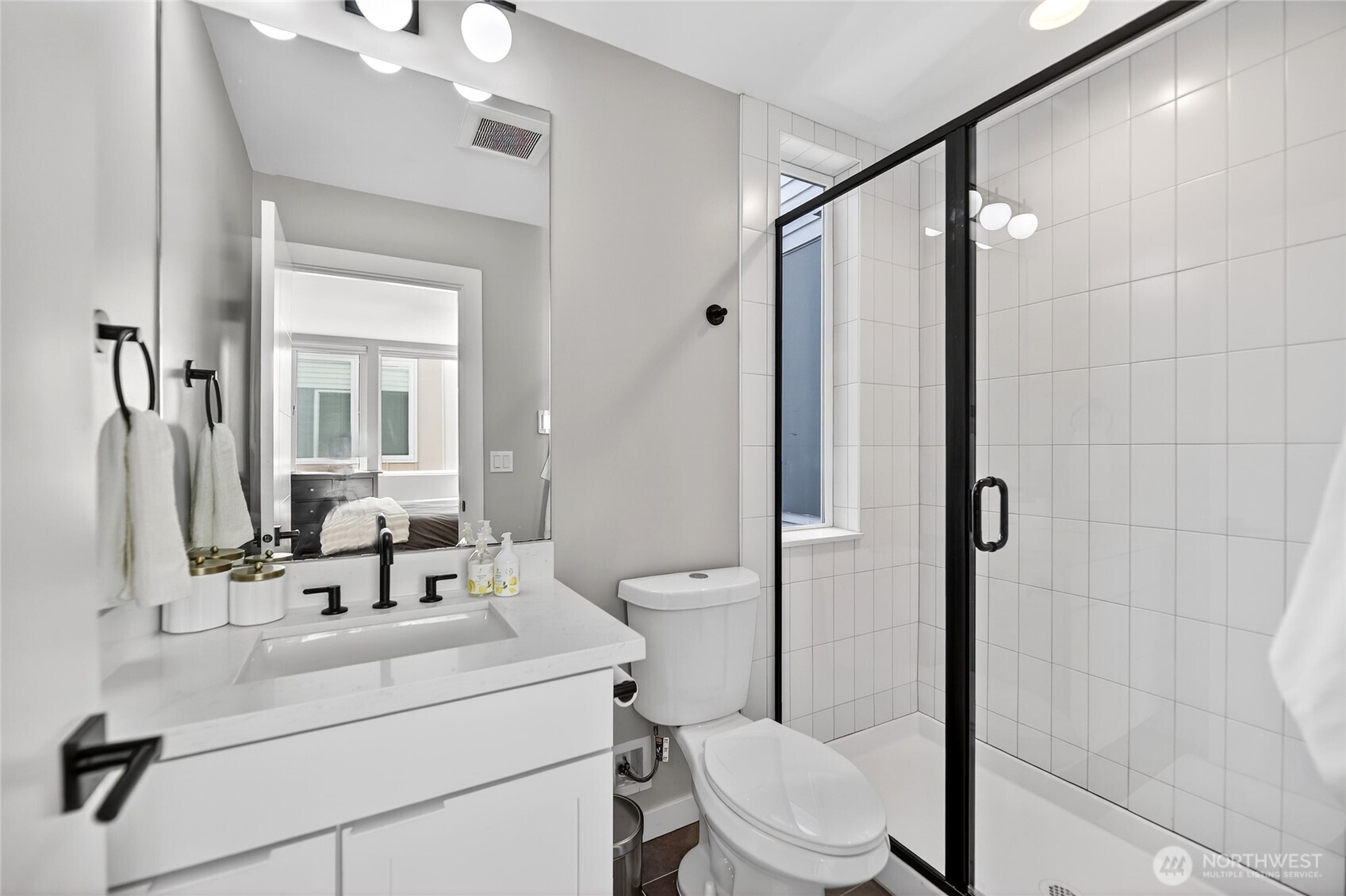 6320 41st Avenue Southwest, Unit B Seattle, WA 98136 - Photo 20 of 31 a bathroom with a sink a toilet and shower