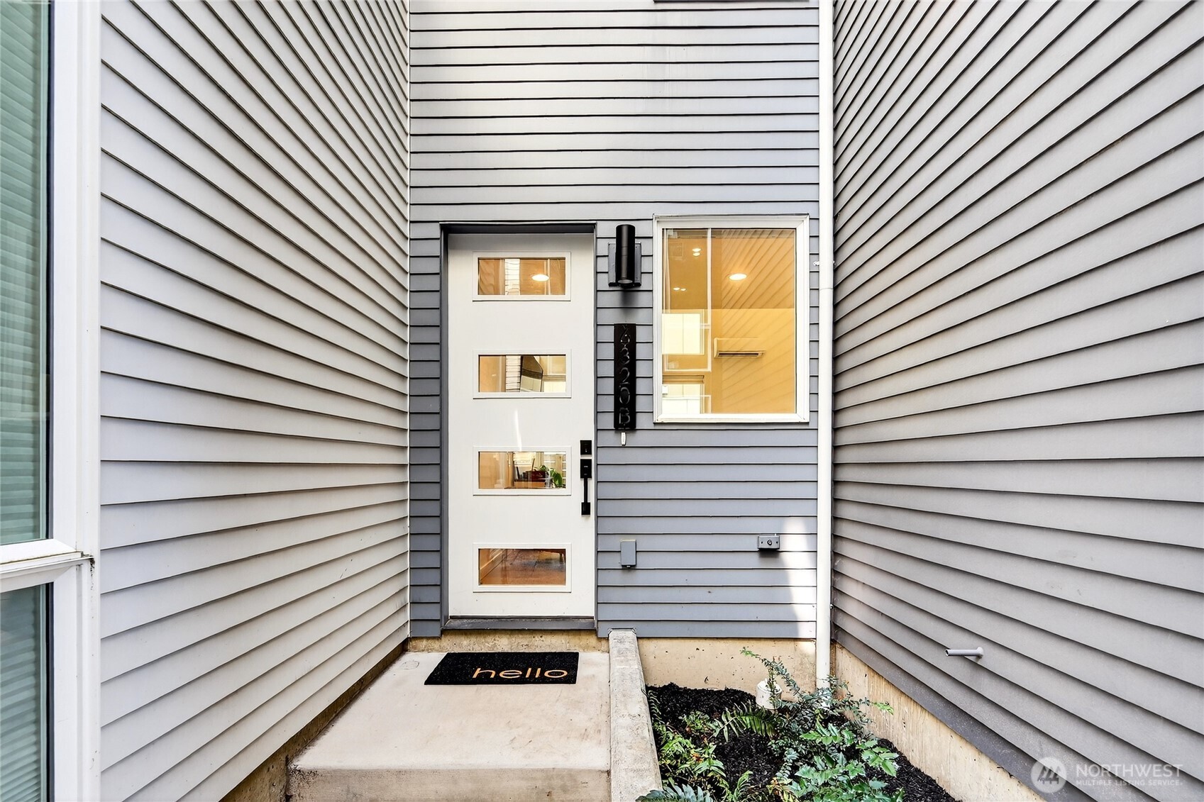 6320 41st Avenue Southwest, Unit B Seattle, WA 98136 - Photo 2 of 31 a view of a back side of house