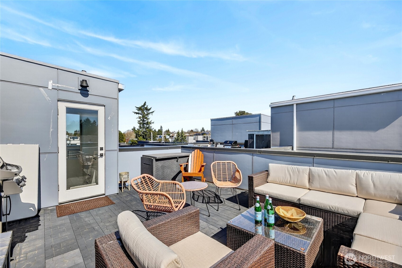 6320 41st Avenue Southwest, Unit B Seattle, WA 98136 - Photo 22 of 31 a patio with patio a couch and chairs