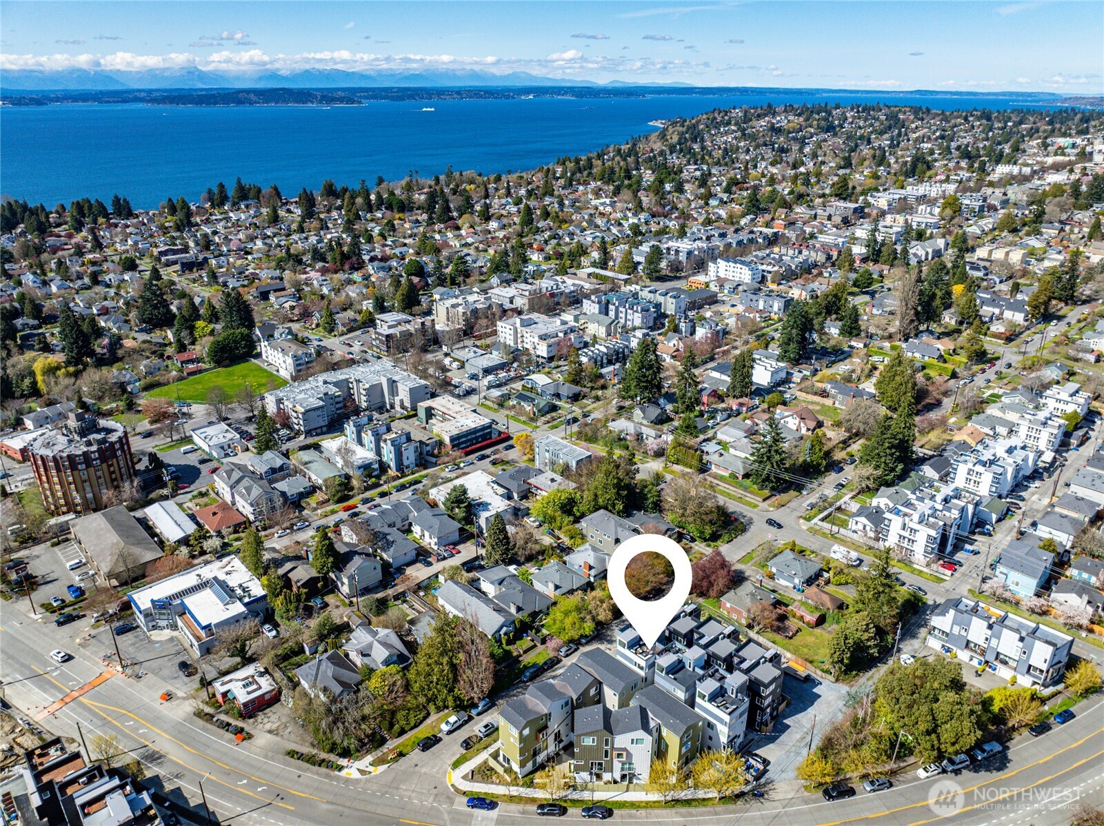 6320 41st Avenue Southwest, Unit B Seattle, WA 98136 - Photo 28 of 31 an aerial view of residential houses with outdoor space