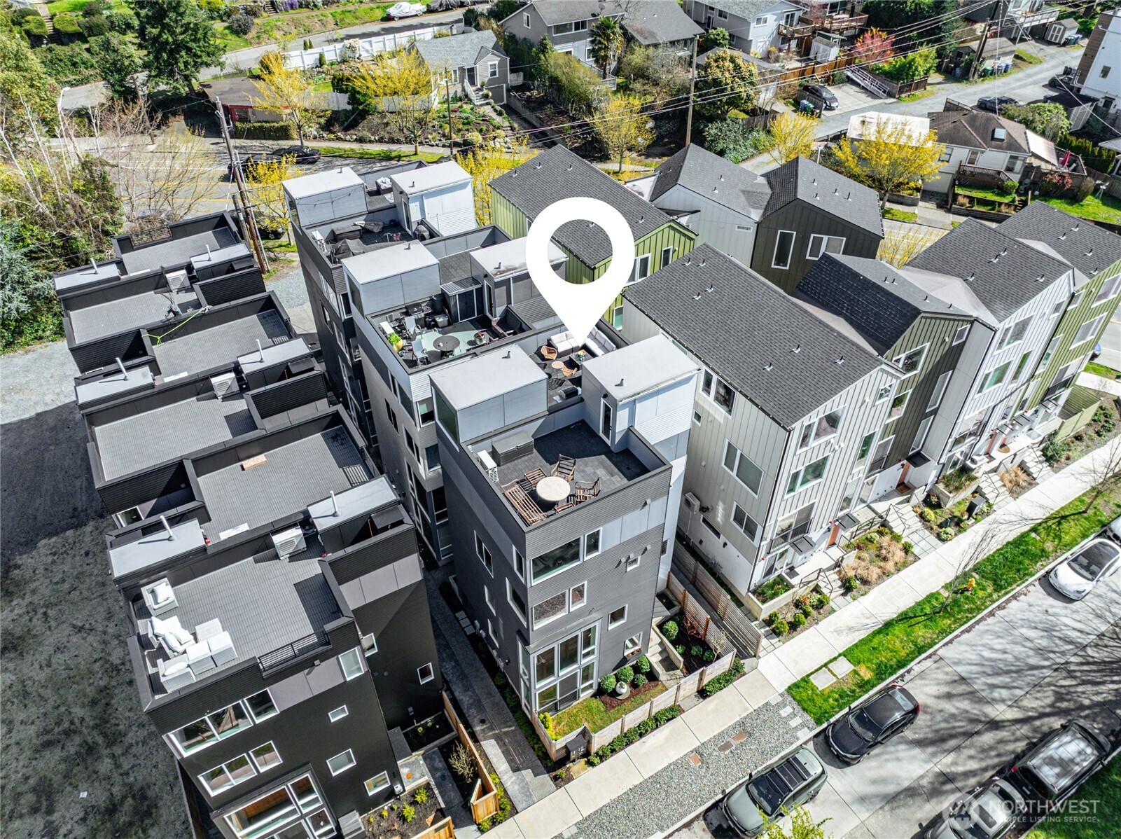 6320 41st Avenue Southwest, Unit B Seattle, WA 98136 - Photo 29 of 31 an aerial view of a house with garden space and street view