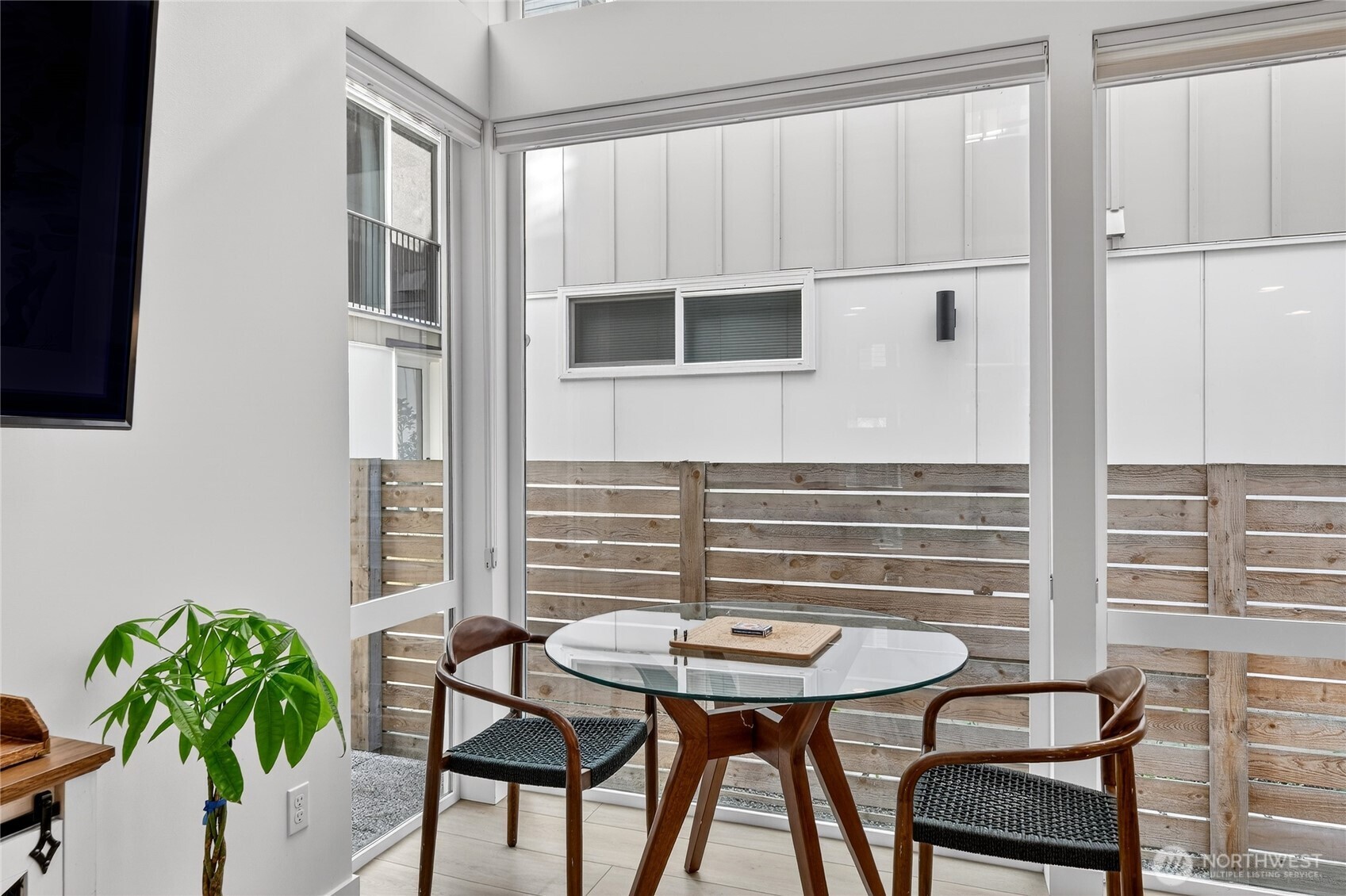 6320 41st Avenue Southwest, Unit B Seattle, WA 98136 - Photo 8 of 31 a view of a dining room with furniture and window