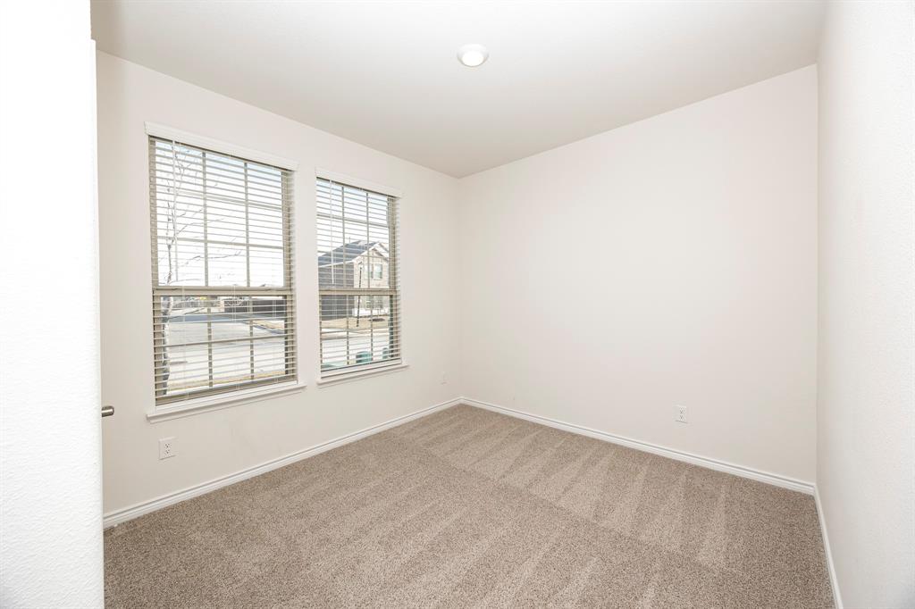 1001 Marigold Street Princeton, TX 75407 - Photo 14 of 37 an empty room with a window