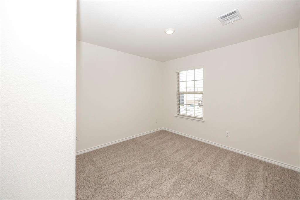 1001 Marigold Street Princeton, TX 75407 - Photo 28 of 37 a view of an empty room with a window