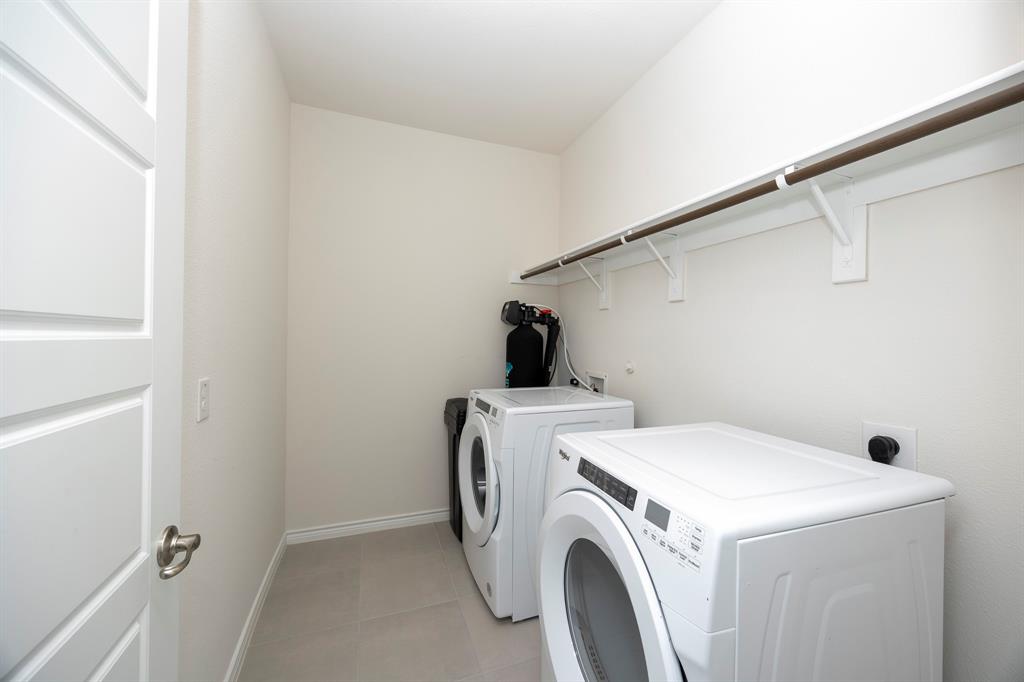 1001 Marigold Street Princeton, TX 75407 - Photo 6 of 37 a utility room with dryer and washer
