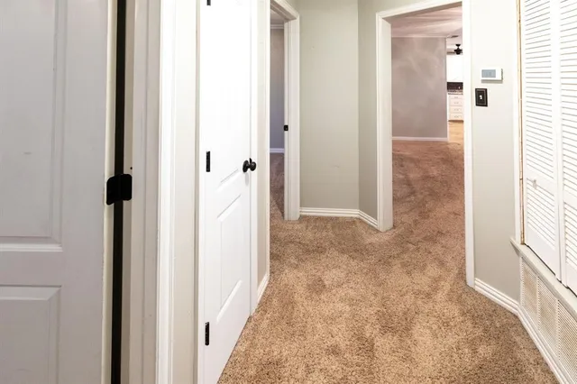 a view of a kitchen counter space and a sink