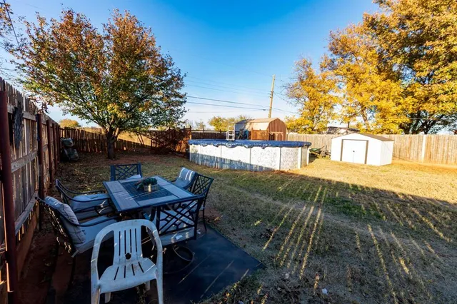 a view of a chairs and table on the terrace