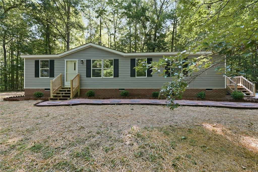 6041 Burlington Road Gibsonville, NC 27249 - Photo 1 of 29