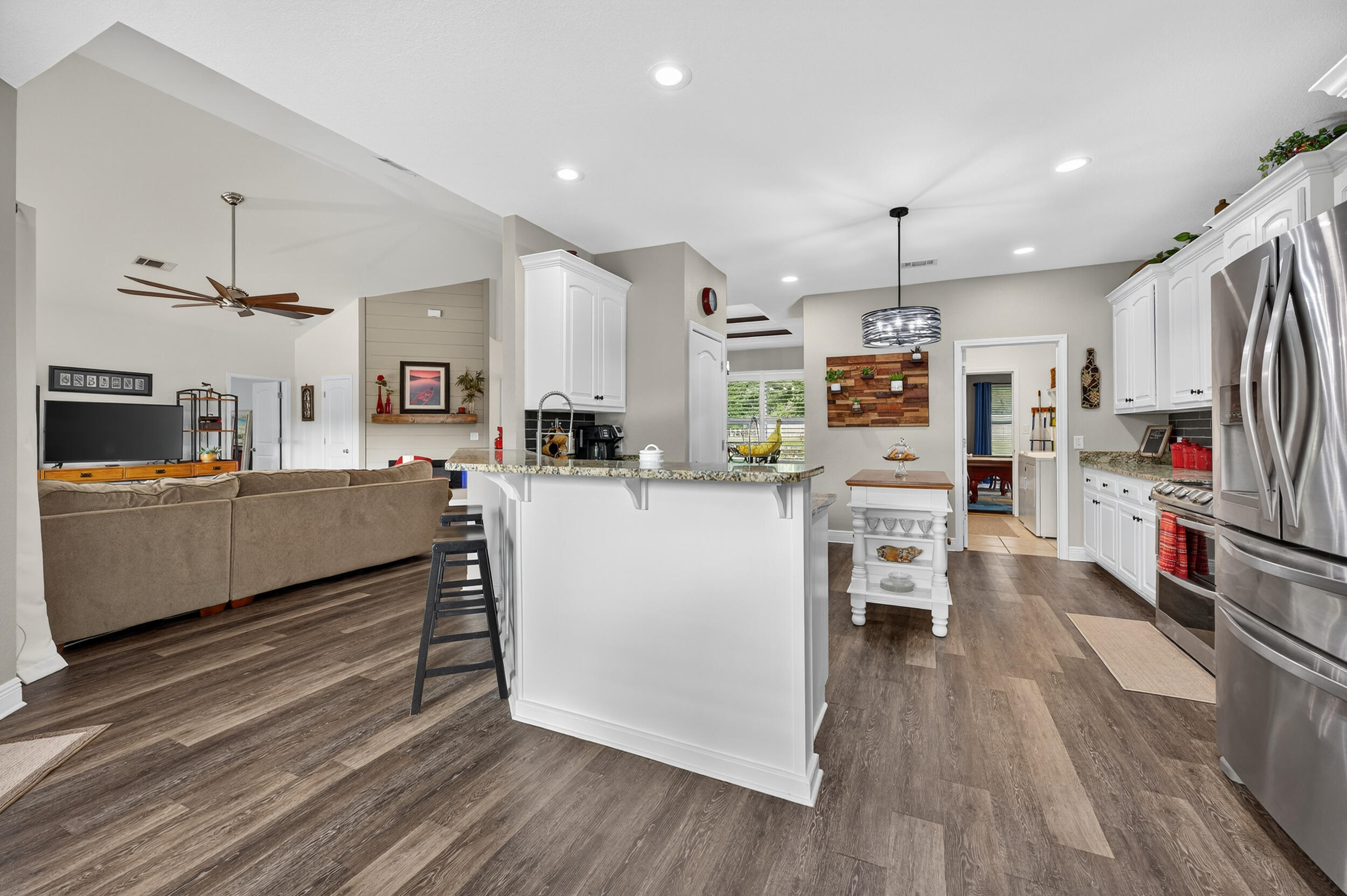 4036 Lakeview Drive Crestview, FL 32539 - Photo 11 of 45 a kitchen with stainless steel appliances a refrigerator and a stove top oven