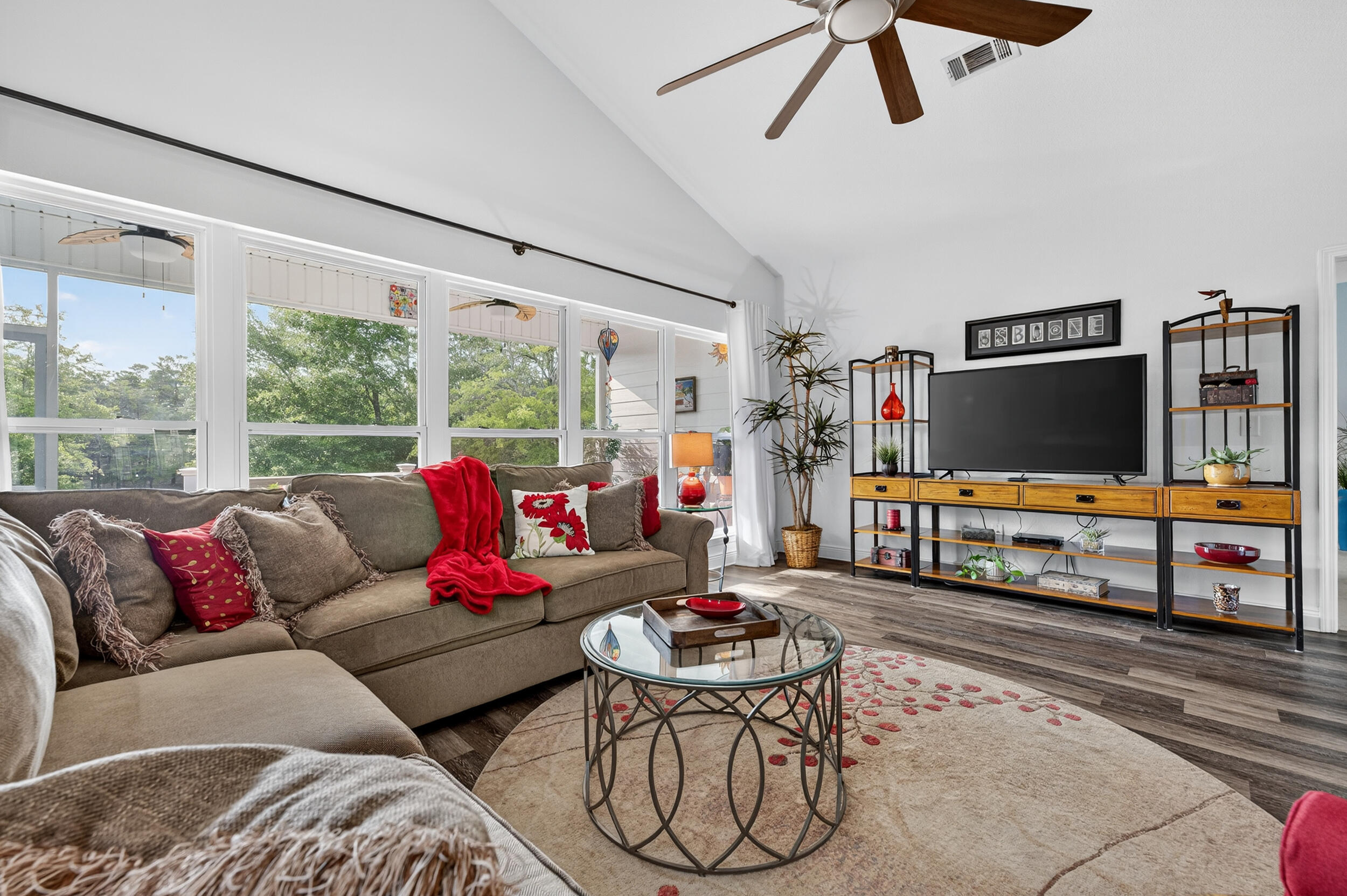 4036 Lakeview Drive Crestview, FL 32539 - Photo 15 of 45 a living room with furniture and a flat screen tv