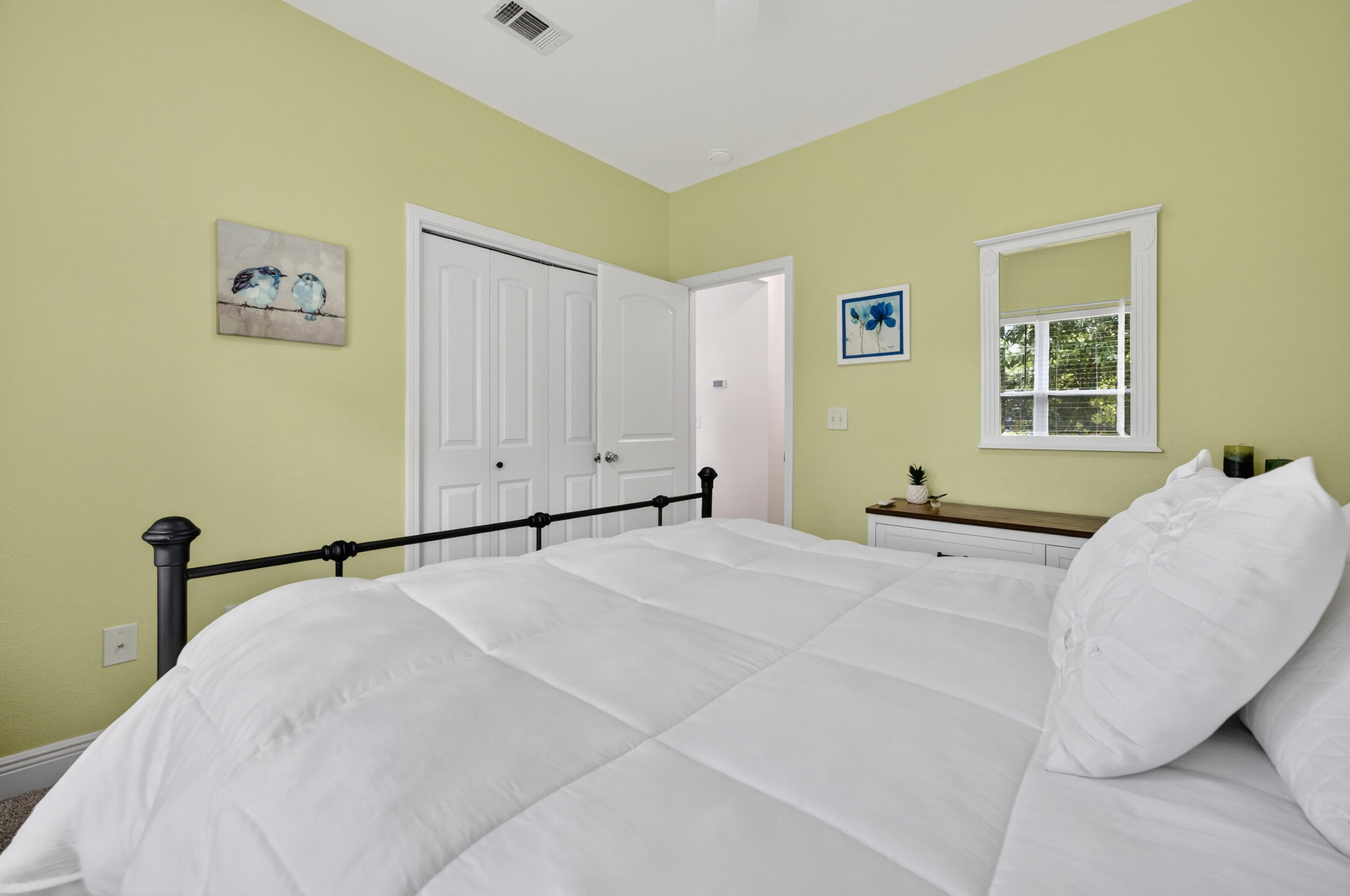 4036 Lakeview Drive Crestview, FL 32539 - Photo 18 of 45 a bedroom with a bed and a window