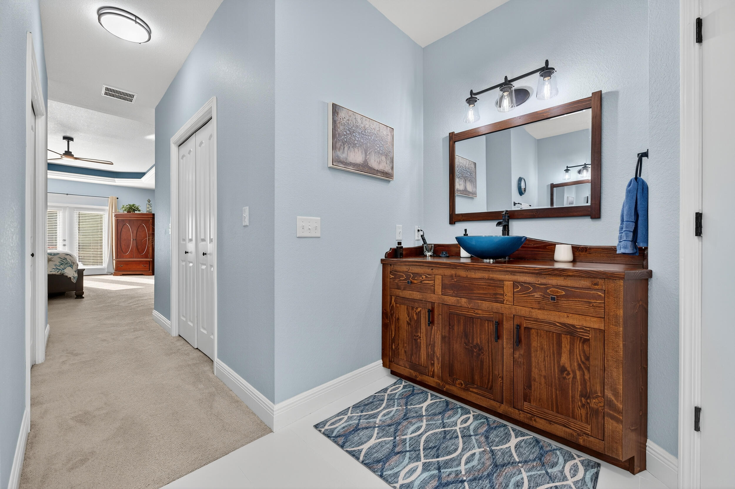4036 Lakeview Drive Crestview, FL 32539 - Photo 22 of 45 a view of living room with furniture and mirror
