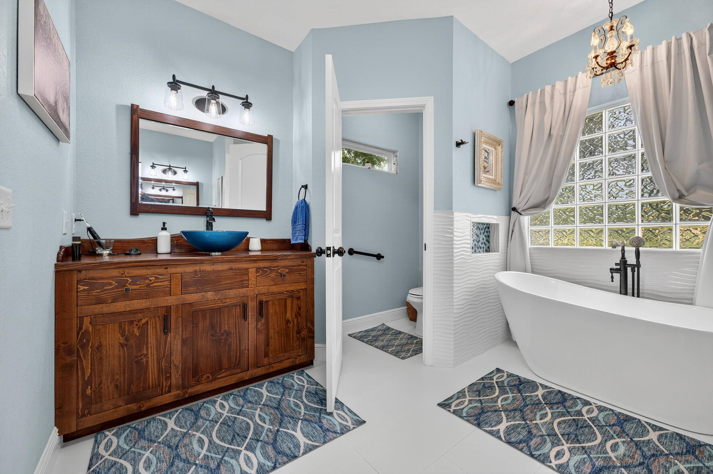 4036 Lakeview Drive Crestview, FL 32539 - Photo 23 of 45 a living room with a couch and a dresser