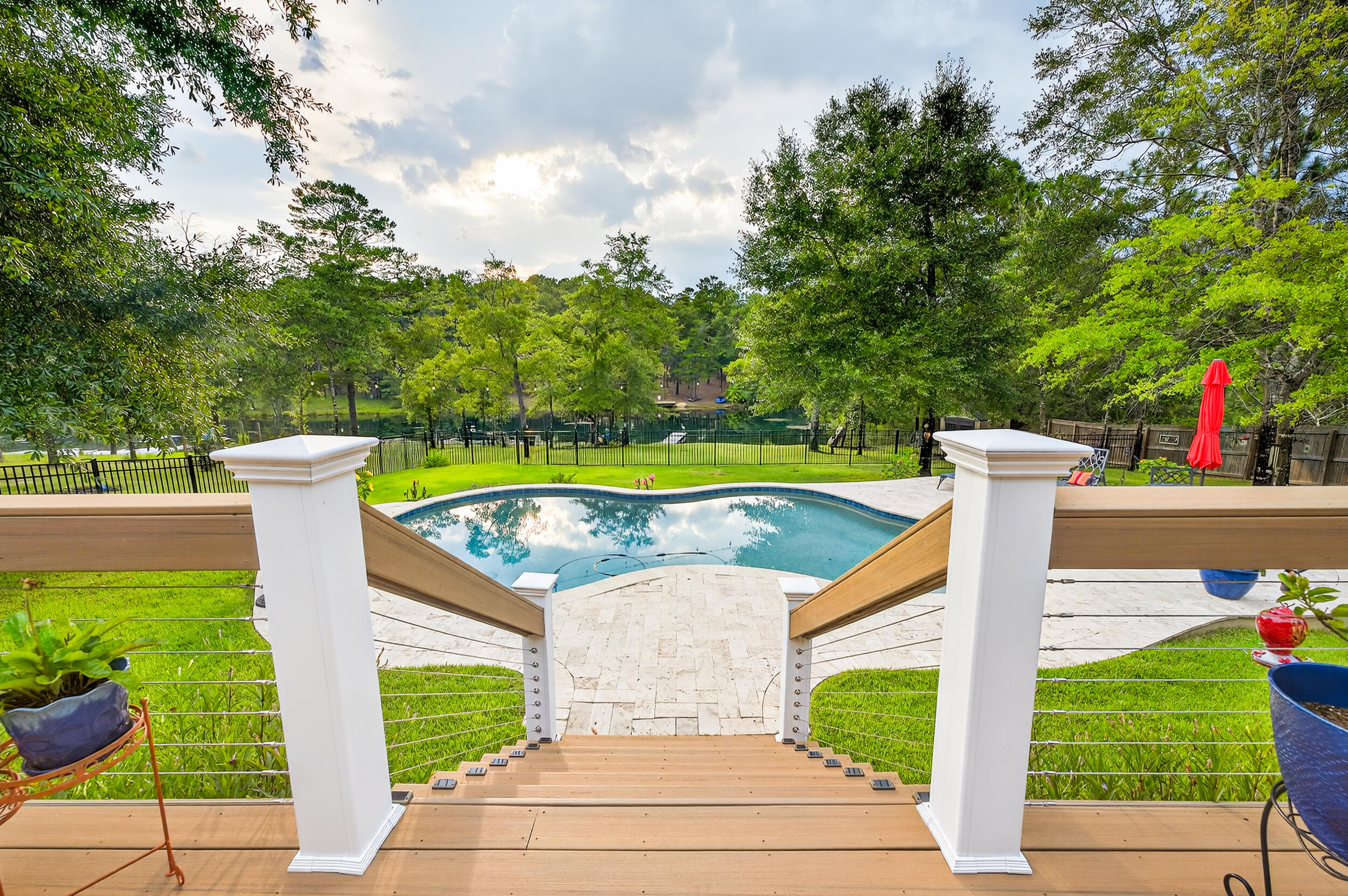 4036 Lakeview Drive Crestview, FL 32539 - Photo 34 of 45 a aerial view of a house with a yard and furniture