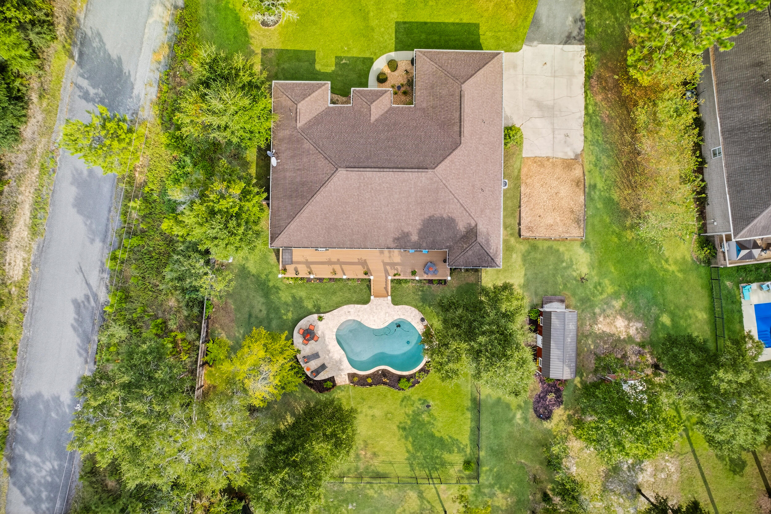 4036 Lakeview Drive Crestview, FL 32539 - Photo 42 of 45 an aerial view of a house with a yard and trees