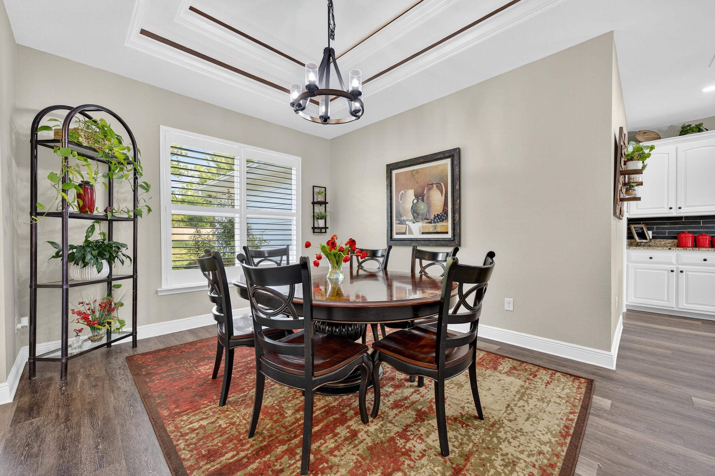4036 Lakeview Drive Crestview, FL 32539 - Photo 6 of 45 a view of a dining room with furniture wooden floor and a chandelier