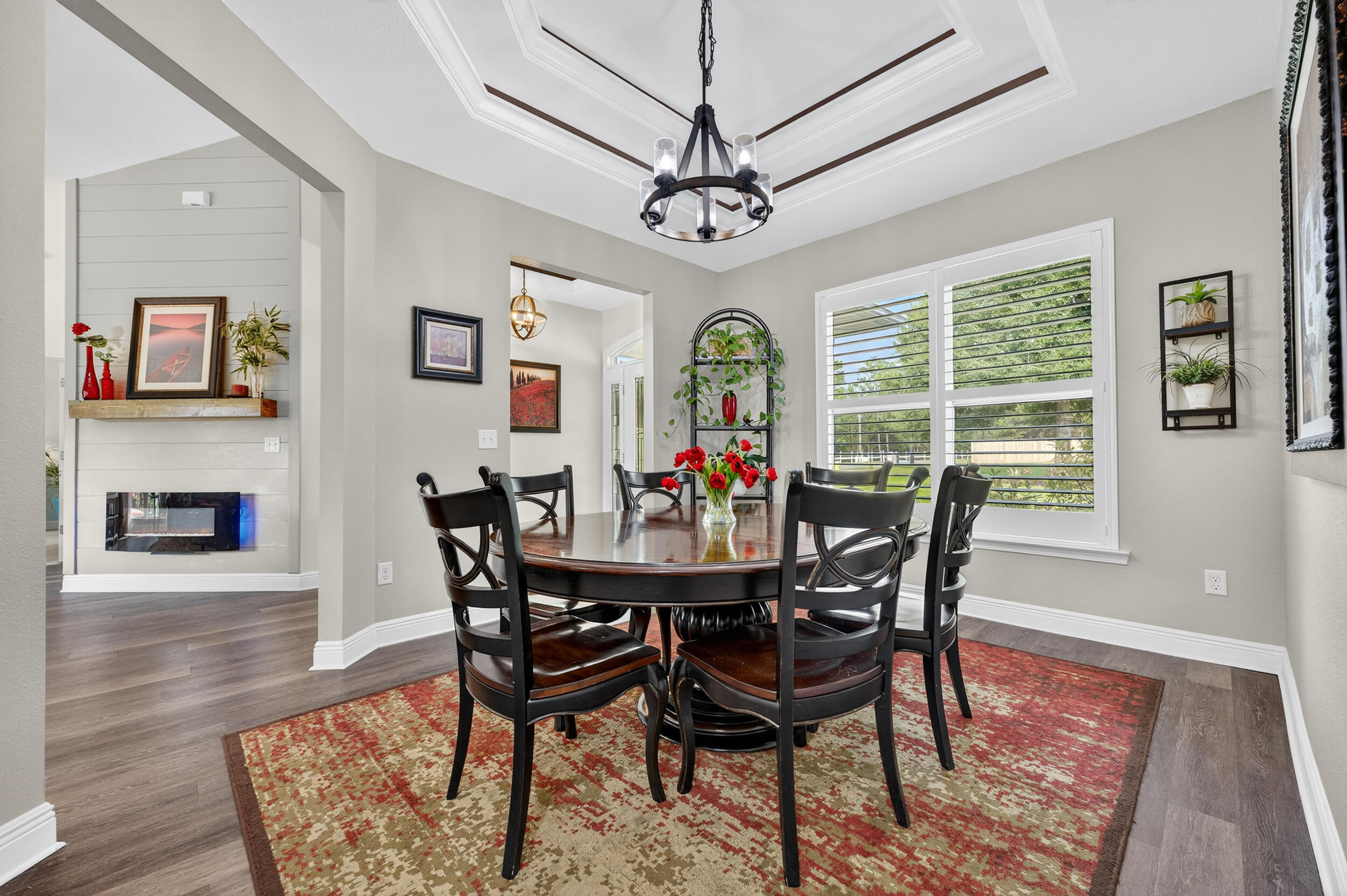 4036 Lakeview Drive Crestview, FL 32539 - Photo 7 of 45 a view of a dining room with furniture window and wooden floor