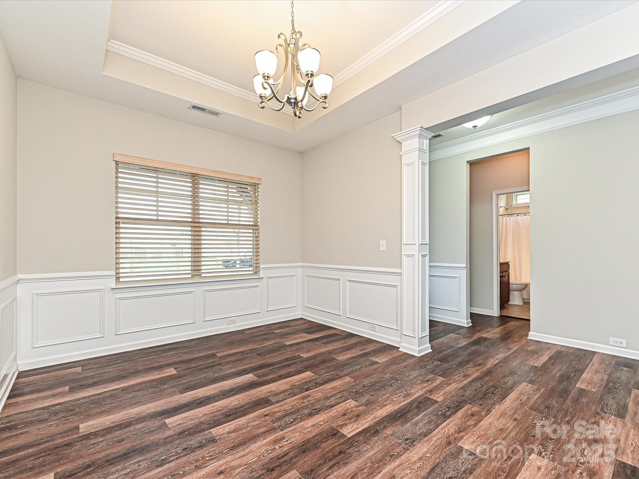 4425 Marlay Park Indian Trail, NC 28079 - Photo 16 of 33 a view of empty room with wooden floor and fan