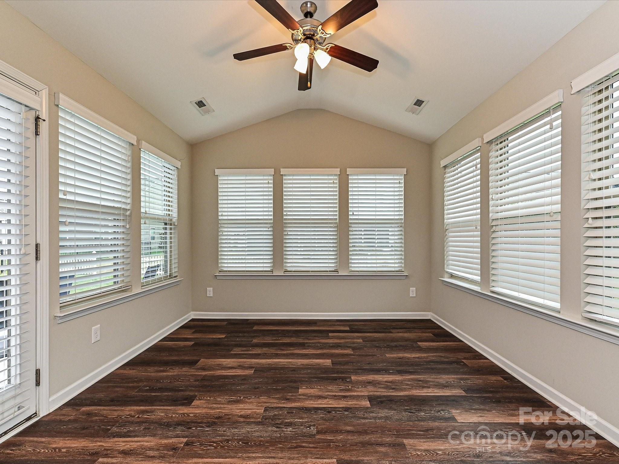 4425 Marlay Park Indian Trail, NC 28079 - Photo 19 of 33 a view of an empty room with wooden floor and a window
